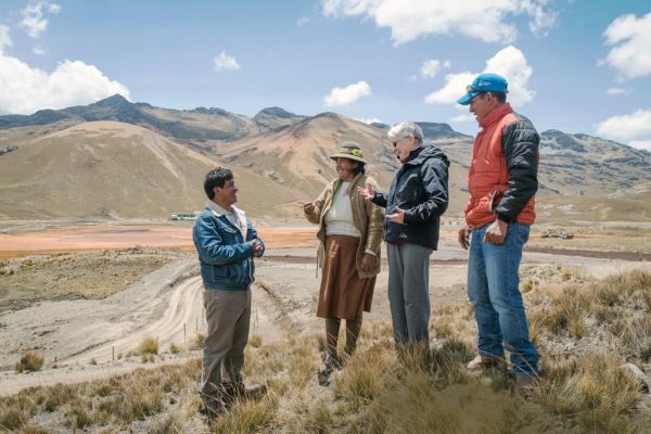 Maryknoll Sister confers with Condoraque village leaders in the altiplano of Peru
