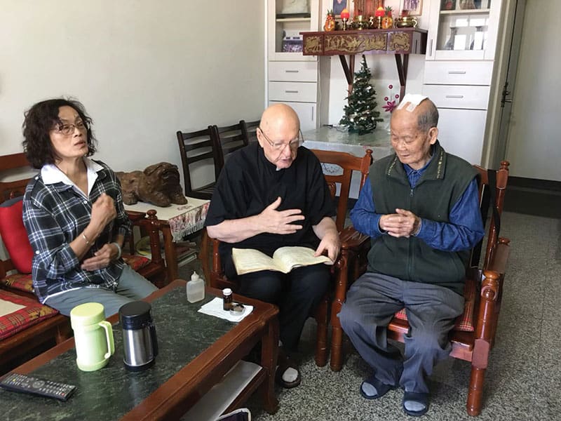 Father Murray and members of the Legion of Mary visit parishioners weekly in Taichung. The priest has served the people of his parish for 35 years. (Courtesy of Our Lady of China / Taiwan Church)