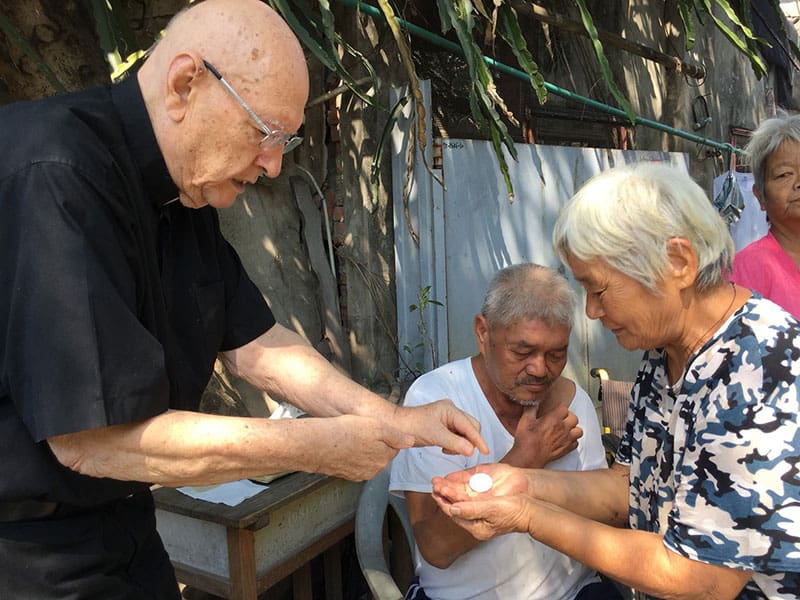 Father Murray visits elderly or sick parishioners at least three times a week, bringing the sacraments to them. (Courtesy of Our Lady of China / Taiwan Church)