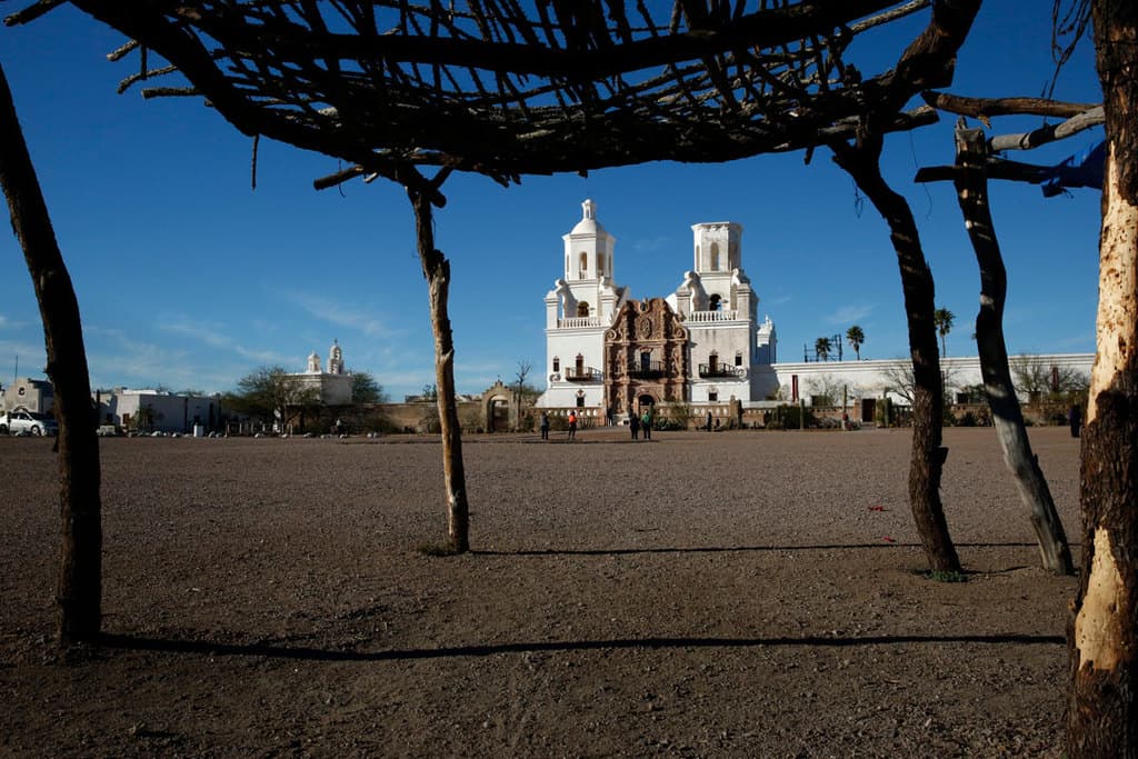 San Xavier Mission in Tucson, Ariz., founded by Jesuit missionary Father Eusebio Kino, is seen in this 2017 file photo. On July 13, 2020, Pope Francis recognized Father Kino's heroic virtues, giving him the title "venerable" and advancing his sainthood cause. (CNS photo/Nancy Wiechec)