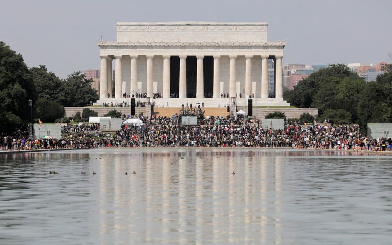 Demonstrators in Washington gather at the Lincoln Memorial for the "Get Your Knee Off Our Necks" march Aug. 28, 2020. The event marked the 57th anniversary of the Rev. Martin Luther King Jr.'s "I Have a Dream" speech that resonated from the same spot on the Lincoln Memorial. (CNS photo/Andrew Kelly, Reuters)