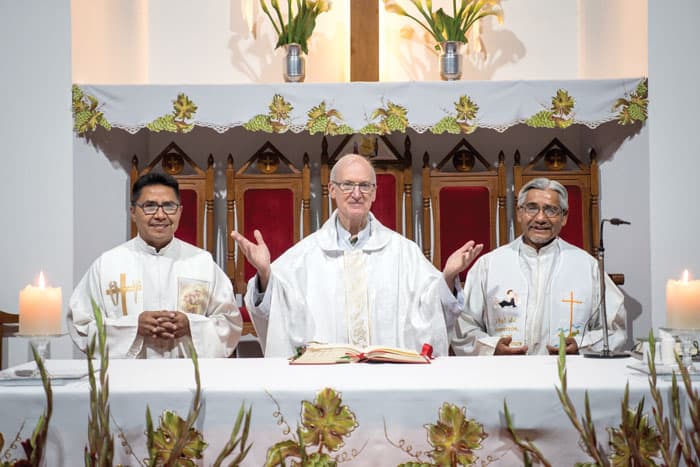 From left to right: Father David Cardozo, pastor of Our Lady of La Salette parish; Father Daniel Chapin and Father Cruz are ready to celebrate  Mass. (Nile Sprague/Bolivia)