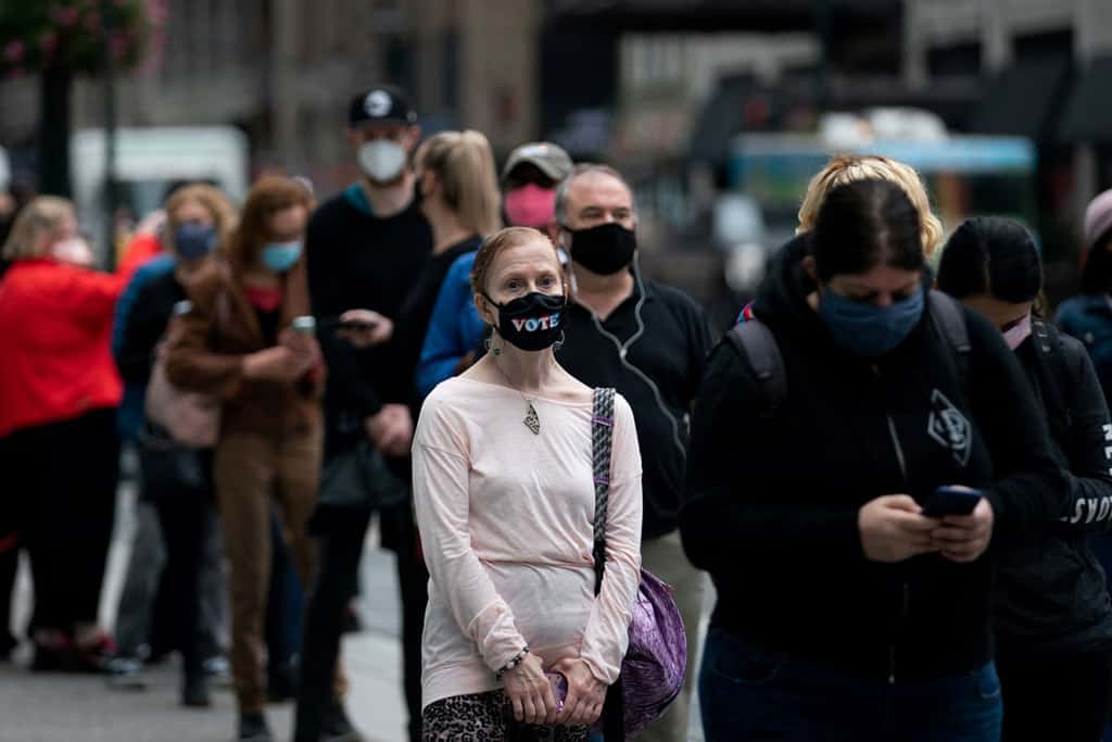 Web-ELECTION-NEWYORK-1007790 Voters in New York City line up to cast ballots outside Madison Square Garden Oct. 24, 2020, on the first day of early voting for the presidential election. (CNS/Jeenah Moon, Reuters)