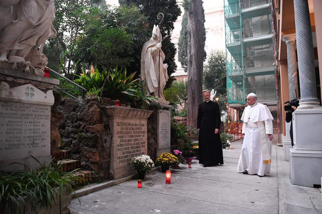 Pope Francis walks to the tombs in the cemetery of the Pontifical Teutonic College at the Vatican to pray on All Souls' Day, Nov. 2, 2020. (CNS/Vatican Media)