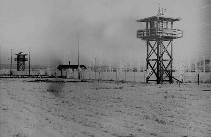 Tule Lake Segregation Center, the last of the relocation centers to close, in 1946, was surrounded by barbed wire fencing and guarded from towers by soldiers with guns. (Courtesy of Helen Parra)