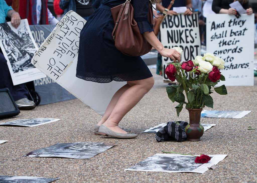 Peace activists hold a Catholic prayer service of repentance near the White House for the use of nuclear weapons on Japan during World War II in this 2018 file photo. As the encyclical "Fratelli Tutti, on Fraternity and Social Friendship” concludes, Pope Francis prays that God will "inspire in us a dream of renewed encounter, dialogue, justice and peace." (CNS/Tyler Orsburn)