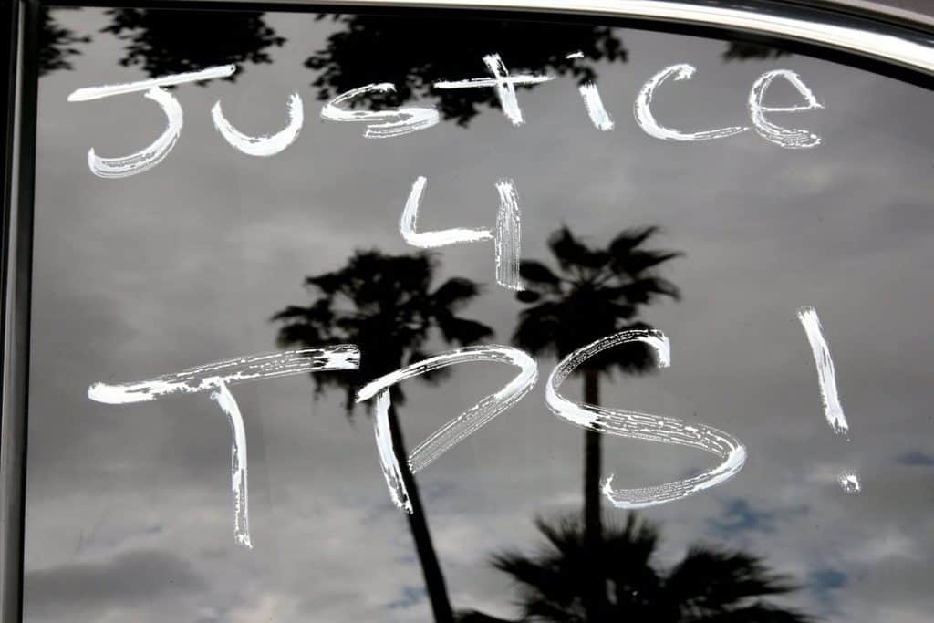 TPS EXTENTIONS "Justice 4 TPS" is seen Oct. 3, 2018, on a car window in Los Angeles, a rallying cry to protect the Temporary Protected Status program. (CNS photo/Kyle Grillot, Reuters)