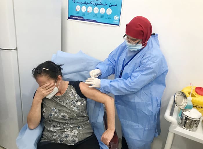 A woman receives an injection of the Sputnik V COVID-19 vaccine in Algiers, Algeria, Jan.31, 2021. (CNS photo/Abdelaziz Boumzar, Reuters)