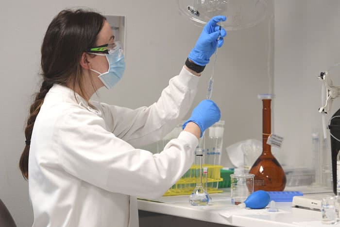 20210212T1015-VACCINES-ASIA-AUSTRALIA-1004254 Asia and Ocenia vaccine roundup -A chemist works at AstraZeneca's headquarters in Sydney Aug. 19, 2020. Australia hopes to vaccinate 20 million people against COVID-19 by October. (CNS photo/Dan Himbrechts, AAP Image via Reuters)