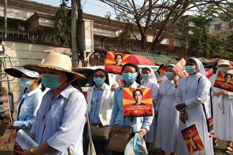 Catholic nuns holding images of ousted leader Aung San Suu Kyi recite prayers and the rosary during a peaceful protest in Yangon on Feb. 21, 2021. (Photo: Good Shepherd Myanmar)