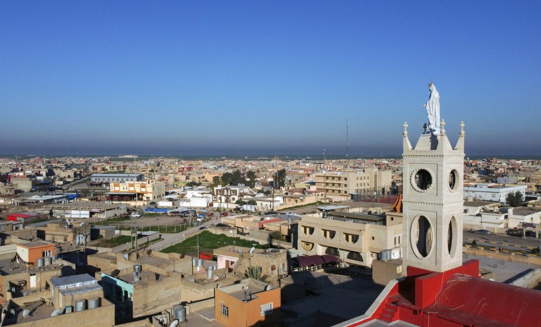 A statue of Mary is seen atop the Church of the Immaculate Conception in the Christian town of Qaraqosh, Iraq, Feb. 23, 2021. Pope Francis plans to Qaraqosh March 7 during his March 5-8 trip to Iraq. (CNS photo/Thaier al-Sudani, Reuters)