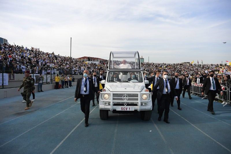 Pope Francis greets the crowd as he arrives to celebrate Mass at Franso Hariri Stadium in Irbil, Iraq, March 7, 2021. (CNS photo/Vatican Media)