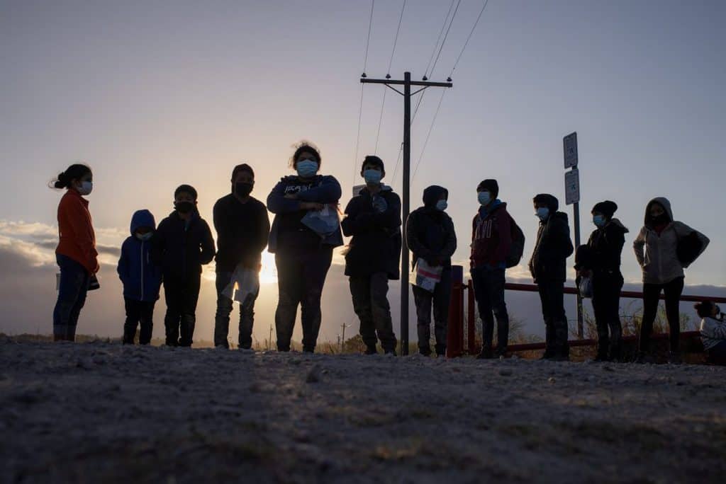 MEXICO U.S. MIGRATION Unaccompanied minors seeking asylum in the U.S., await transport in Penitas, Texas, March 12, 2021, after crossing the Rio Grande River. (CNS photo/Adrees Latif, Reuters)