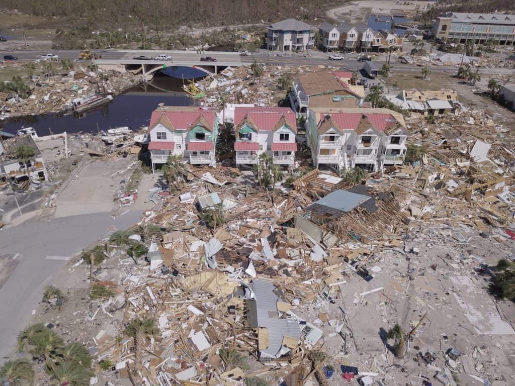 FILE HURRICANE FLORIDA An aerial photo shows damaged and destroyed homes after Hurricane Michael smashed into Florida's northwest coast in Mexico Beach, Florida, in this October 12, 2018, file photo. Many climate scientists have associated an increased number of natural disasters and their severity with climate change. (CNS photo/Dronebase, Reuters)