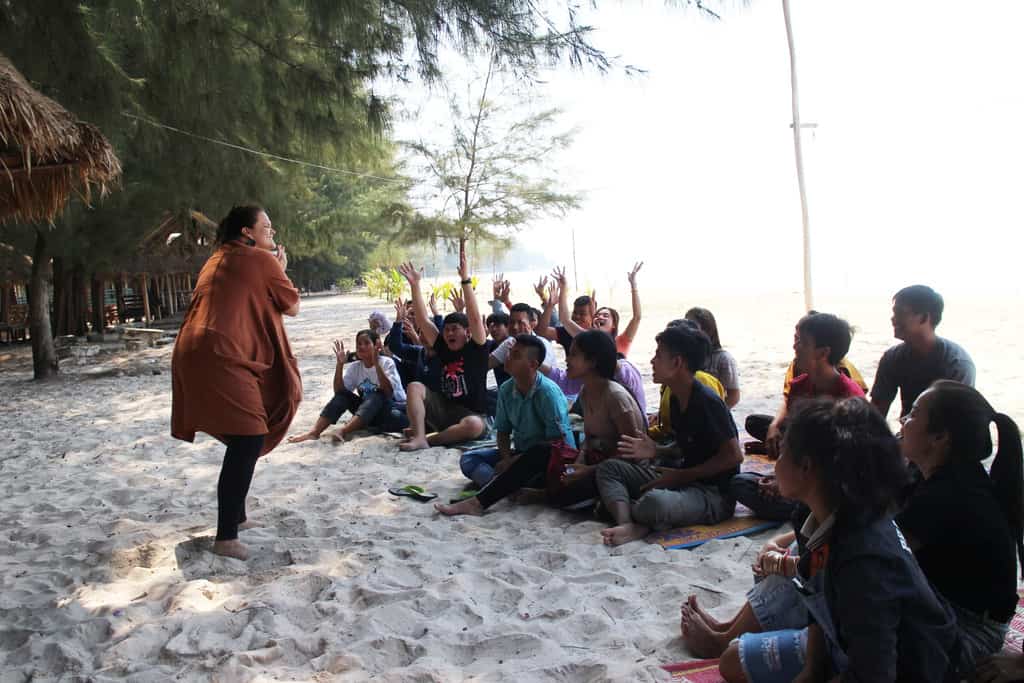 Maryknoll Lay Missioner Julie Lawler leads a relay team building activities with hearing and deaf staff at Deaf Development Programme in Koh Kong, Cambodia (Photo: Chhun Vandeth, Cambodia) With article One Year In: Reflecting on the Gifts of the Holy Spirit