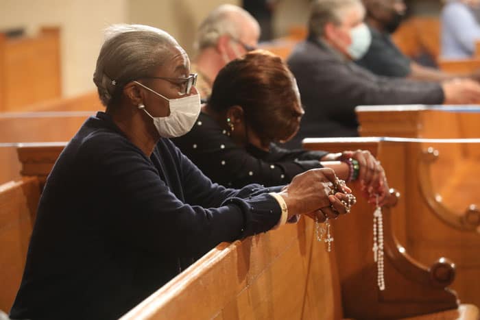 People pray the rosary at the Basilica of the National Shrine of the Immaculate Conception in Washington May 17, 2021. The rosary, led by Washington Cardinal Wilton D. Gregory, was part of a worldwide effort called by Pope Francis to pray for an end to the coronavirus pandemic. (CNS photo/Andrew Biraj, Catholic Standard)