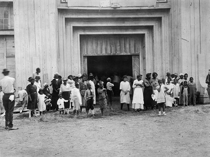 TULSA RACE MASSACRE OF 1921 An entrance to a refugee camp is seen on the Tulsa, Okla., fair grounds after the 1921 race massacre. (CNS photo/American National Red Cross, Library of Congress, Handout via Reuters)