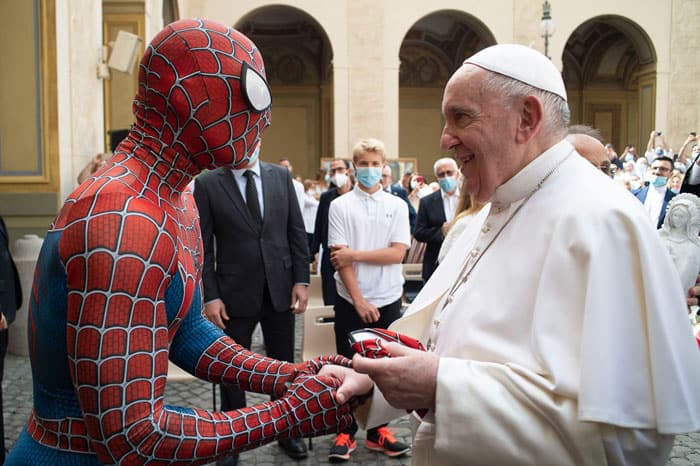 Pope Francis greets Mattia Villardita, 27, from northern Italy, dressed as Spider-Man, during his general audience in the San Damaso Courtyard of the Apostolic Palace at the Vatican June 23, 2021. The pope began a new series of audience talks focused on St. Paul's Letter to the Galatians and its lessons about evangelization, faith and freedom. (CNS photo/Vatican Media)
