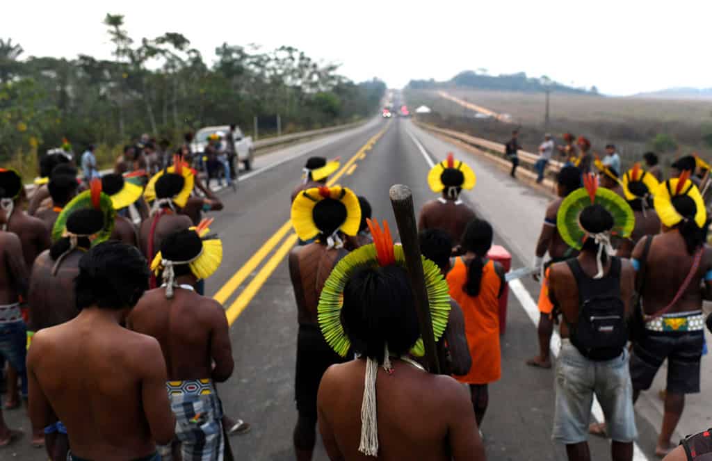 Kayapo indigenous people block a key Brazilian grain highway during a protest in Novo Brasil Aug. 18, 2020. The tribe said in a statement that the federal government has not consulted them on a plan to build a railway next to their land. (CNS photo/Lucas Landau, Reuters)