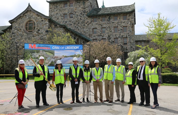 Maryknoll Superior General Father Raymond Finch (second from left) joins Ossining’s town supervisor, Ecogy Energy employees, Maryknoll’s Eco-Mission team and employees at the groundbreaking of the solar panel project at Maryknoll’s headquarters, the first community solar energy system in Ossining, New York. (Diane Mastrogiulio/U.S.)