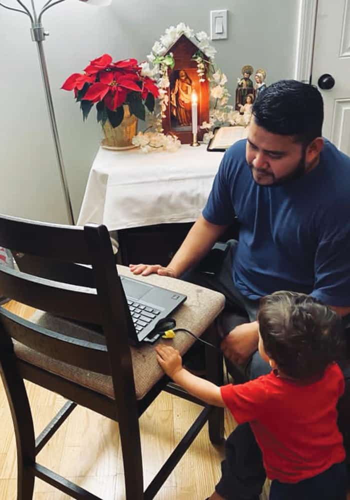 Ovidio and son Aaron invite family members to join online in honoring the Sacred Heart. (Courtesy of Alejandro Lopez-Cardinale/U.S.)