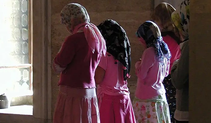 Before the quarantine and trauma of COVID-19, Father Dennis Moorman distributed Holy Communion at Mass at St. Joseph Church in Peruas, Sao Paulo, Brazil. (Nile Sprague/Brazil)