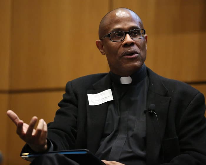 Father Bryan Massingale, a theology professor at Fordham University in New York City, is seen during a 2017 panel discussion in New York. (CNS photo/Bruce Gilbert, Fordham University)