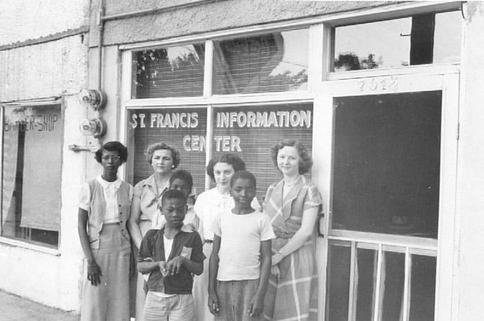 Members of Pax Christi are pictured in this 1952 photo outside of the St. Francis Information Center in Greenwood, Miss., with youths who came to the center. The Catholic organization was a key player in the civil rights movement. (CNS photo/Bishop Oliver Gerow, courtesy Diocese of Jackson Archives)