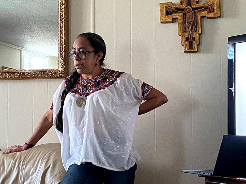 Before the quarantine and trauma of COVID-19, Father Dennis Moorman distributed Holy Communion at Mass at St. Joseph Church in Peruas, Sao Paulo, Brazil. (Nile Sprague/Brazil)