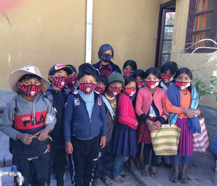 Students in Tacopaya wear facemasks sewn by Phuong Minh Nguyen. (Courtesy of Phuong Minh Nguyen/Bolivia)