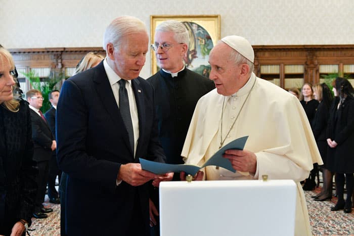 U.S. President Joe Biden exchanges gifts with Pope Francis during a meeting at the Vatican Oct. 29, 2021. (CNS photo/Vatican Media)