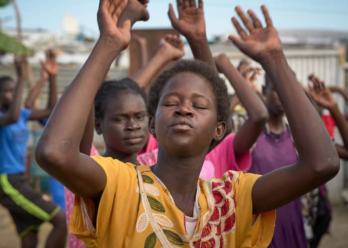 Members of a youth dance group practice for their participation in Sunday Mass at the camp. (Paul Jeffrey/South Sudan)