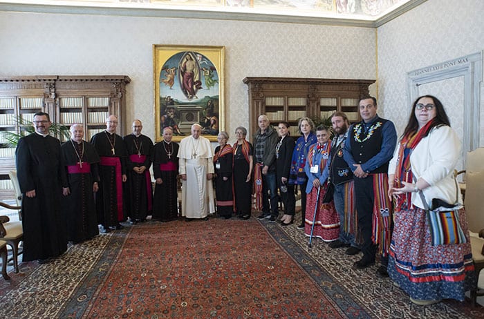 After World Mission Sunday Mass at St. Ferdinand Church, pastor Father Jason Torba and Cardinal Blase Cupich greet the congregation, including all those who do mission in Chicago. (Julie Jaidinger, Chicago Catholic/U.S.)