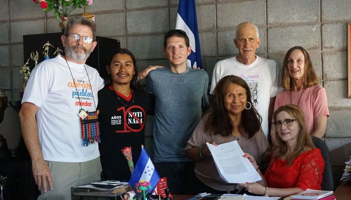 Clif Bachmeier (third from left), a member of the Maryknoll Young Adult Community, and a delegation from the United States met with one of the educators who were persecuted for supporting public education in Honduras.