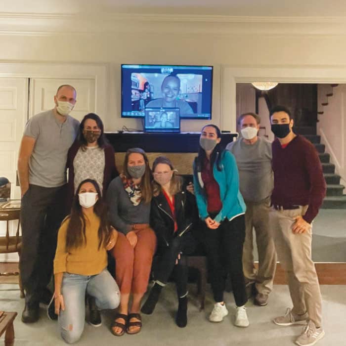 Members of the Seattle YAE community and Maryknoll Father Edward Shellito, chaplain (second from right), gather for a monthly meeting in 2021. (Courtesy Anna Johnson/U.S.)