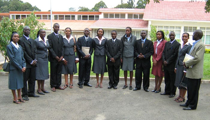 John Siyumbu (second from left) is shown with other student members of the Parish Pastoral Council in 2009.