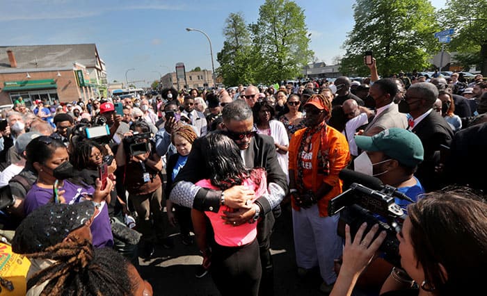 After World Mission Sunday Mass at St. Ferdinand Church, pastor Father Jason Torba and Cardinal Blase Cupich greet the congregation, including all those who do mission in Chicago. (Julie Jaidinger, Chicago Catholic/U.S.)