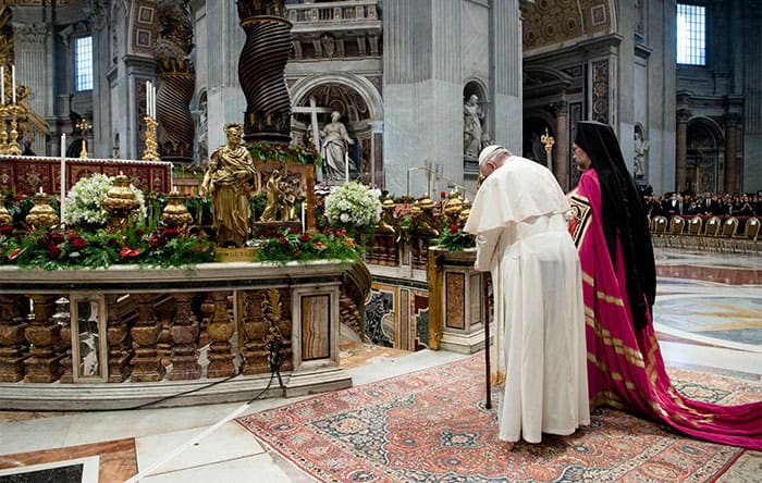 After World Mission Sunday Mass at St. Ferdinand Church, pastor Father Jason Torba and Cardinal Blase Cupich greet the congregation, including all those who do mission in Chicago. (Julie Jaidinger, Chicago Catholic/U.S.)