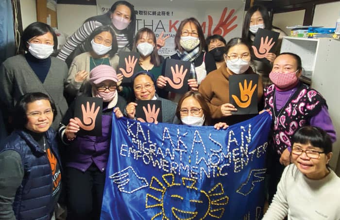 24-29-Sr-Avelino-03 Maryknoll Sister Abby Avelino (bottom left) joins partners, members and staff of Kalakasan to call attention to human trafficking. (Courtesy Abby Avelino/Japan)