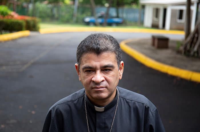 Before the quarantine and trauma of COVID-19, Father Dennis Moorman distributed Holy Communion at Mass at St. Joseph Church in Peruas, Sao Paulo, Brazil. (Nile Sprague/Brazil)