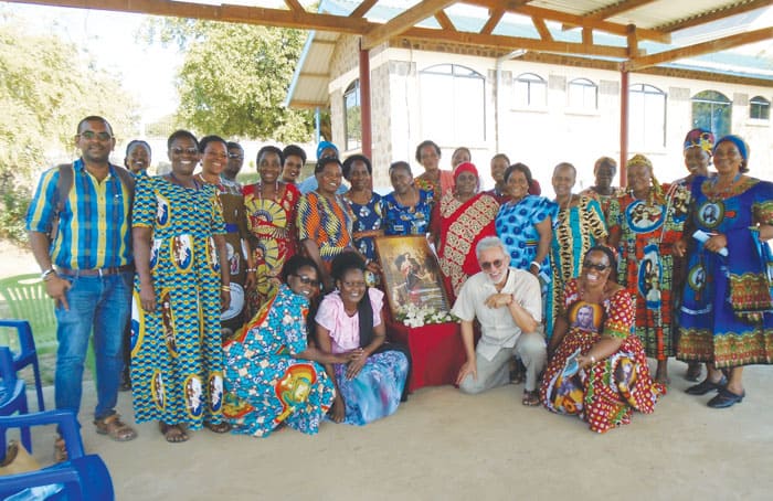 Maryknoll Father James Eble directs a retreat for the local praying community on devotion to Our Lady, Untier of Knots, teaching forgiveness and letting go of “knots” of resentment. The Lake House of Prayer, on the shores of beautiful and peaceful Lake Victoria, offers directed retreats for groups and individuals. (Courtesy of James Eble/Tanzania)