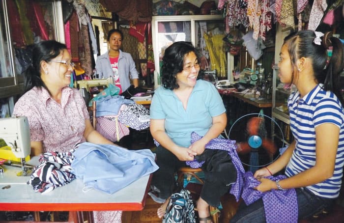 Maryknoll Sister Montiel visits people in Cambodia as part of Seedling of Hope, a program to provide support to people living with HIV and their families. (Sean Sprague/Cambodia)