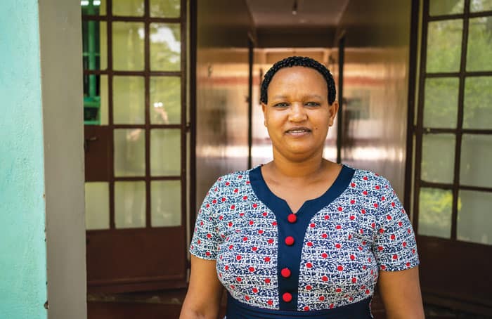 Emusoi graduate Teika Simango, who went on to college and law school, works as the center’s legal advisor and program officer. (Gregg Brekke/Tanzania)
