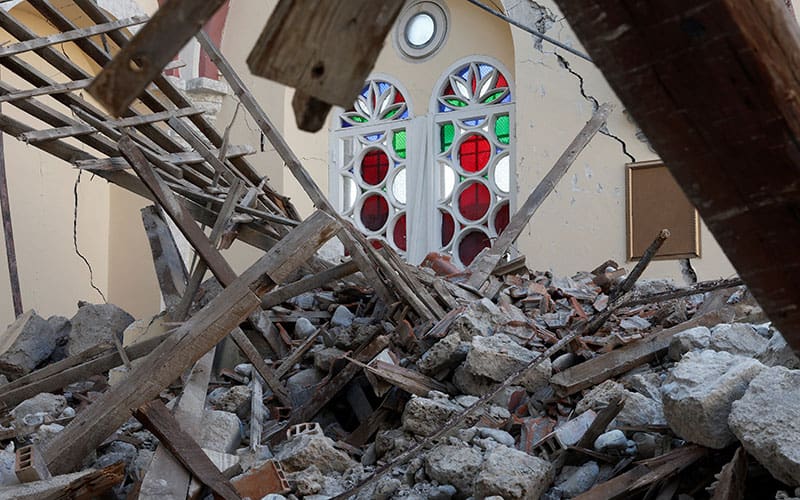 20230211T1730-TURKEY-SYRIA-EARTHQUAKE-1756048 After World Mission Sunday Mass at St. Ferdinand Church, pastor Father Jason Torba and Cardinal Blase Cupich greet the congregation, including all those who do mission in Chicago. (Julie Jaidinger, Chicago Catholic/U.S.)