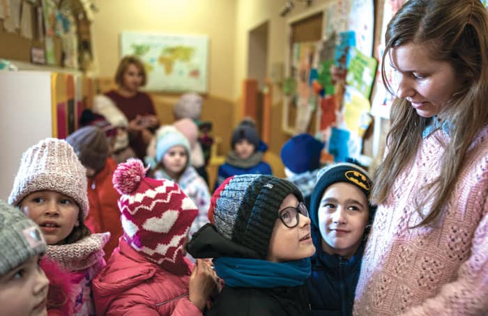 Parish school administrator Kateryna Chvalova (far right) runs a school that provides education for many children of internally displaced families living in Fastiv, Ukraine. (Gregg Brekke/Ukraine)