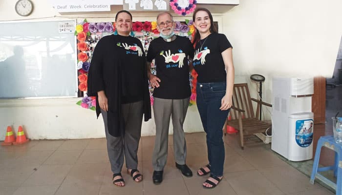 Maryknoll Lay Missioner Julie Lawler, Father Charlie Dittmeier and Maryknoll Lay Missioner Kylene Fremling (right) celebrate Deaf Week at DDP in September 2022. (Sopor Lay, DDP/ Cambodia)