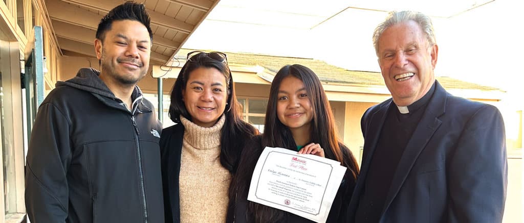 Caelyn Alcantara, shown with her parents, is presented the Bishop Francis X. Ford Award by Maryknoll Father Stephen Judd in San Francisco. (Courtesy of Stephen Judd/U.S.)