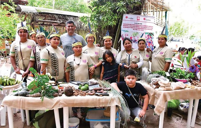 Maryknoll Sister Esperanza Principio (center) joins Indigenous farming families at an event. (Courtesy of Esperanza Principio/Peru)