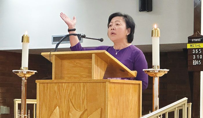 24-28-MKLM-Sending-Ceremony-02 New Maryknoll Lay Missioner Julienne “T.T.” Hoang, a cantor, leads the responsorial psalm sung in English and Vietnamese. (Courtesy of Maryknoll Lay Missioners/U.S.)