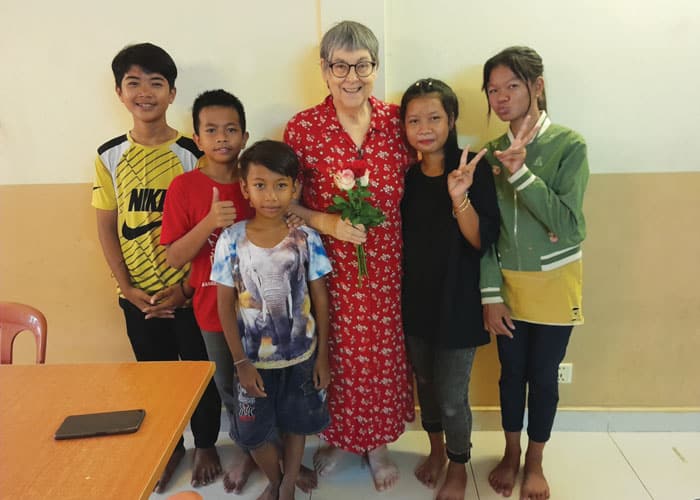 40-44-Sr-Pellicore-02 Maryknoll Sister Ann Sherman, who spent a decade in Cambodia, teaches an English class for middle school students in Beoung Tum Pun. (Courtesy of Ann Sherman/Cambodia)